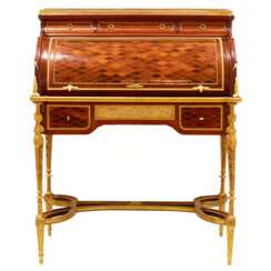 E.KAHN. A magnificent cylindrical bureau in mahogany and satin wood with gilt bronze. 