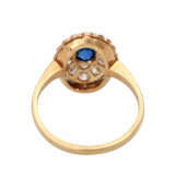 Hübscher Ring mit 1 Saphir und Diamanten - фото 4