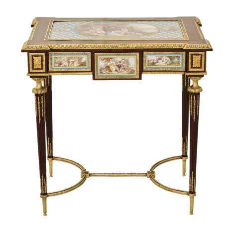 A magnificent ladies table with gilded bronze decor and porcelain panels in the style of Adam Weisweiler. France. 19th century Porcelain Hand Painted Gilding Napoleon III 19th century - photo 2