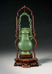 AN ARCHAISTIC SPINACH-GREEN JADE HANGING VASE AND COVER