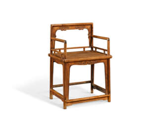 A HUANGHUALI LOWBACK ARMCHAIR