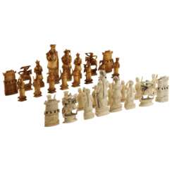 A beautiful set of Chinese ivory chess pieces. The turn of the 19th-20th centuries. 