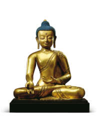 A RARE AND LARGE GILT-BRONZE FIGURE OF THE MEDICINE BUDDHA, BAISAJYAGURU