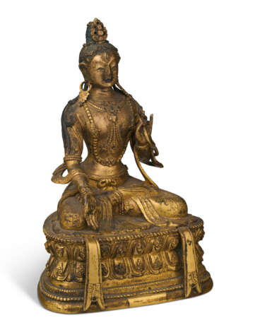 A GILT-BRONZE FIGURE OF TARA - фото 4