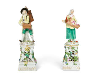 TWO MEISSEN PORCELAIN FIGURES OF A PEEP-SHOW MAN AND A WOMAN WITH A BABY FROM THE 'CRIS DE PARIS' SERIES ON TWO PIERCED PLINTHS