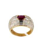 Ruby. Gold ring with ruby and diamonds. 