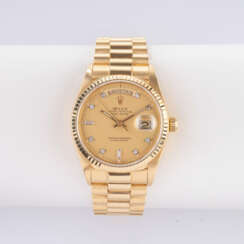 Rolex. Herren-Armbanduhr 'Day-Date 36' Gelbgold mit Diamanten.