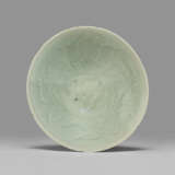 A CELADON STONEWARE FOLIATE SHALLOW BOWL - photo 1