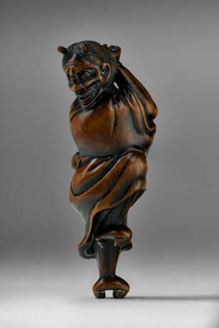 A CARVED WOOD NETSUKE OF A DEMON (ONI) - photo 2