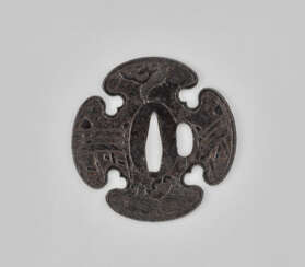 AN IRON TSUBA WITH BRIDGE