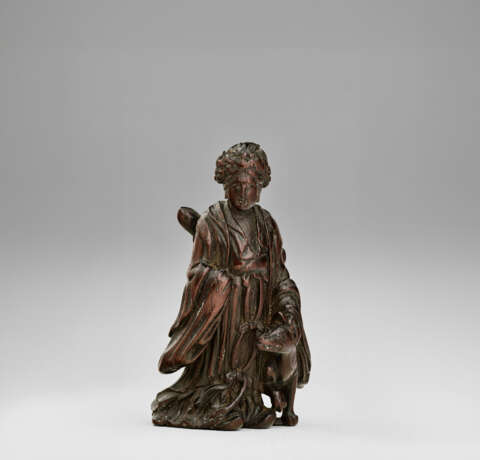 A CARVED WOOD NETSUKE OF DAKKI - photo 1