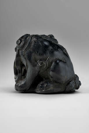 A CARVED WOOD NETSUKE OF A SHISHI HOLDING A BALL - photo 4