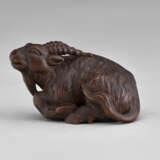 A CARVED WOOD NETSUKE OF A GOAT - photo 2