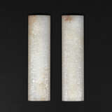 A PAIR OF CARVED WHITE JADE 'DAOIST EMBLEMS' WRIST RESTS - фото 1