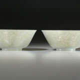 A PAIR OF CARVED GREYISH-GREEN JADEITE BOWLS - photo 2