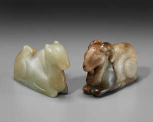 TWO JADE CARVINGS OF RECUMBENT ANIMALS