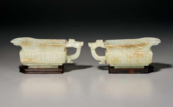 A PAIR OF GREENISH-WHITE AND RUSSET JADE POURING VESSELS - фото 2