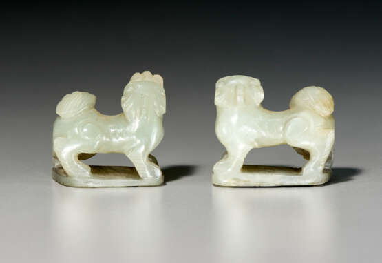 A PAIR OF GREENISH-WHITE AND RUSSET JADE POURING VESSELS - photo 4