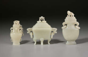 THREE SMALL PALE GREYISH-WHITE JADE VESSELS AND COVERS