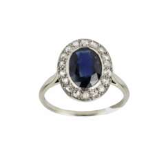 Gold ring with sapphire and diamonds. 