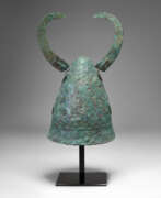 Defensive weapons. A GREEK BRONZE PILOS HELMET