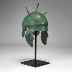 A GREEK BRONZE CHALCIDIAN HELMET