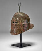 Архаический период. A GREEK BRONZE APULO-CORINTHIAN HELMET