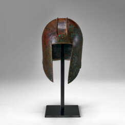 A GREEK BRONZE ILLYRIAN HELMET