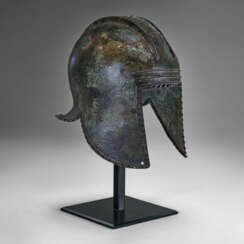 A GREEK BRONZE ILLYRIAN HELMET