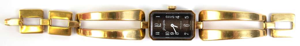 Damen-Armbanduhr "Glashütte", DDR um 1970, Werk GUB, Kaliber 09-20, Handaufzug, braunes reliefiertes achteckiges Zifferblatt mit weißen arabischen Zahlen, gangfähig, 2,7x1,8 cm, goldfarbenes Metallarmband - Foto 1