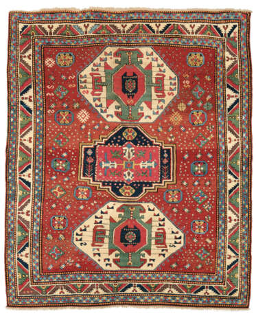 A TRIPLE-MEDALLION KAZAK RUG - photo 1