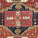 A TRIPLE-MEDALLION KAZAK RUG - photo 2