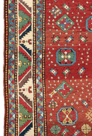 A TRIPLE-MEDALLION KAZAK RUG - photo 3