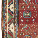 A TRIPLE-MEDALLION KAZAK RUG - photo 3