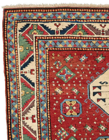 A TRIPLE-MEDALLION KAZAK RUG - photo 4