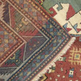 A TRIPLE-MEDALLION KAZAK RUG - photo 5