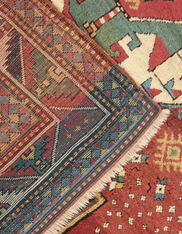 A TRIPLE-MEDALLION KAZAK RUG - photo 5