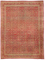 A SIGNED SILK HEREKE CARPET