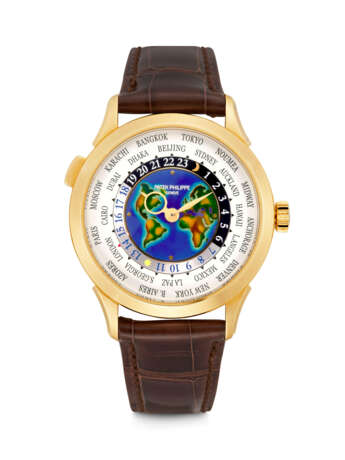 PATEK PHILIPPE. A RARE 18K GOLD AUTOAMTIC WORLD TIME WITH CLOISONN&#201; ENAMEL DIAL - photo 1