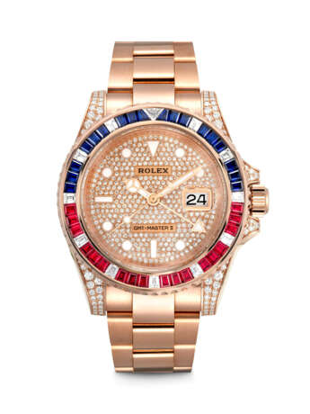 ROLEX. AN 18K PINK GOLD, DIAMOND, RUBY AND SAPPHIRE-SET AUTOMATIC DUAL TIME WRISTWATCH WITH SWEEP CENTRE SECONDS, DATE AND BRACELET - photo 1