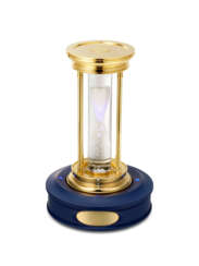 DE BEERS. A BRASS AND DIAMOND HOUR GLASS TIMER