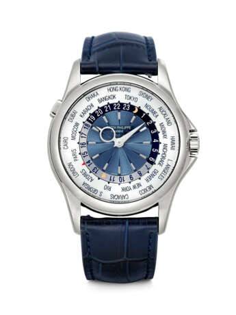 PATEK PHILIPPE. A RARE AND ATTRACTIVE PLATINUM AUTOMATIC WORLD TIME WRISTWATCH - photo 1