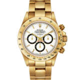 ROLEX. A VERY RARE 18K GOLD AUTOMATIC CHRONOGRAPH WRISTWATCH WITH BRACELET AND "FLOATING DIAL" - фото 1