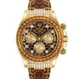 ROLEX. AN IMPRESSIVE 18K GOLD, DIAMOND AND YELLOW SAPPHIRE-SET AUTOMATIC CHRONOGRAPH WRISTWATCH WITH LEOPARD-PRINT DIAL - фото 1