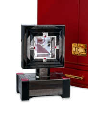 CARTIER. A STUNNING AND EXTREMELY RARE 18K WHITE GOLD, RUBY AND DIAMOND-SET MYSTERY CLOCK WITH ONYX AND OBSIDIAN