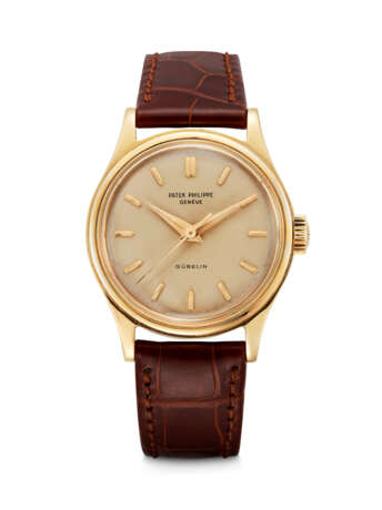 PATEK PHILIPPE. AN 18K GOLD WRISTWATCH WITH SWEEP CENTRE SECONDS - Foto 1