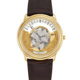 AUDEMARS PIGUET. AN 18K GOLD SEMI-SKELETONISED AUTOMATIC WRISTWATCH WITH WANDERING HOURS - Foto 1