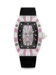 RICHARD MILLE. A LADY’S 18K WHITE GOLD, DIAMOND, PINK GEMSTONE AND MOTHER-OF-PEARL SET AUTOMATIC SEMI-SKELETONISED WRISTWATCH