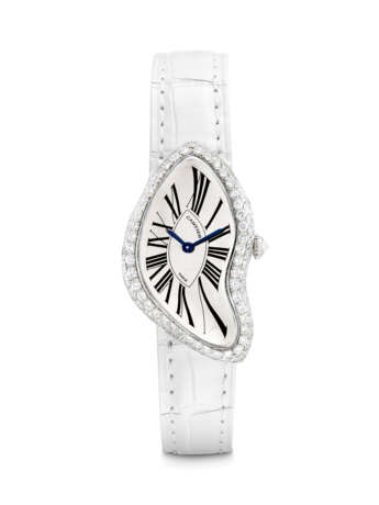 CARTIER. AN EXTREMELY RARE PLATINUM AND DIAMOND-SET ASYMMETRICAL WRISTWATCH - Foto 1