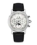 Perpetual calendar. PATEK PHILIPPE. A RARE PLATINUM PERPETUAL CALENDAR SPLIT SECONDS CHRONOGRAPH WRISTWATCH WITH MOON PHASES, 24 HOUR AND LEAP YEAR INDICATION